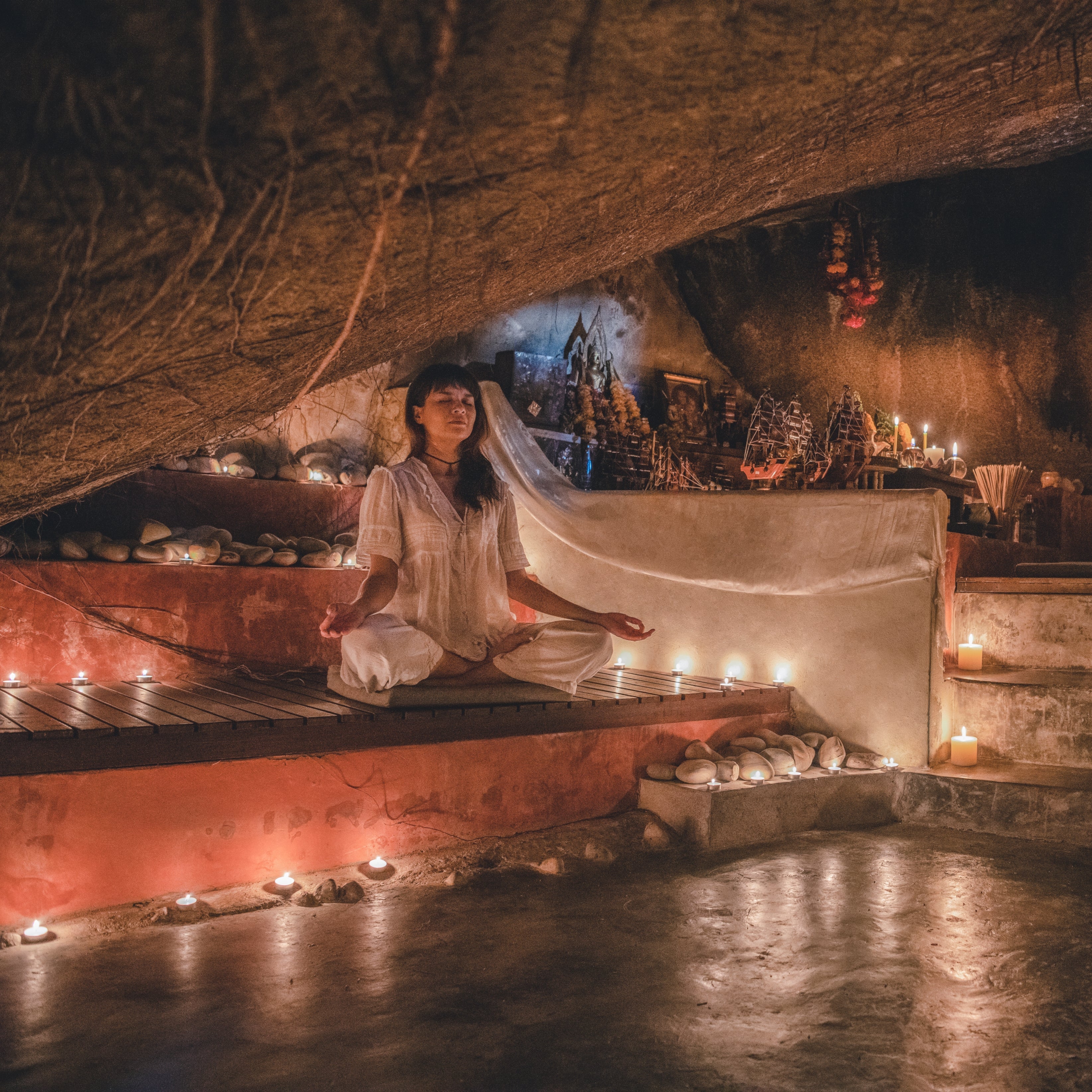 The vibes invite guests to meditate in the cave at the heart of Kamalaya