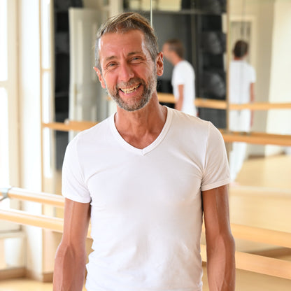 Angelo yoga master in the practice studio